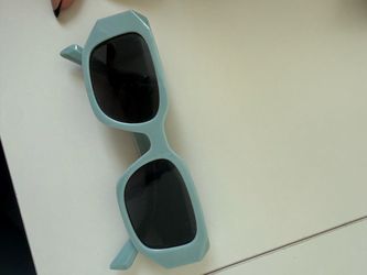 Blue “Prada” sunglasses