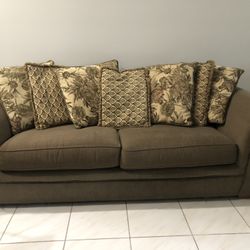 Olive Green Fabric Couch with Tommy Bahama Vibes