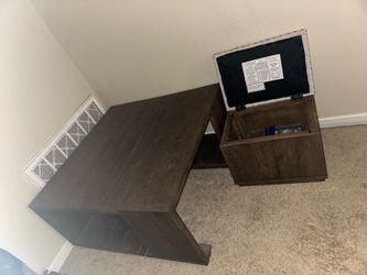 Table with 2 storage chairs