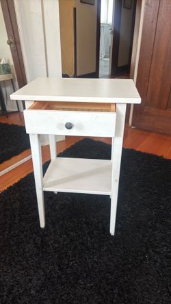 White bedside table