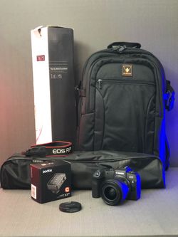 Canon RP Mirrorless with 24-50mm, Godox X3Pro C Touchscreen TTL Wireless Flash Trigger, Padded Camera Bag and tripod (Used Camera)
