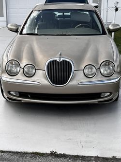 ASIS 2003 Jaguar And New Tire On