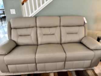Brand New Leather Reclining Sofa and Loveseat