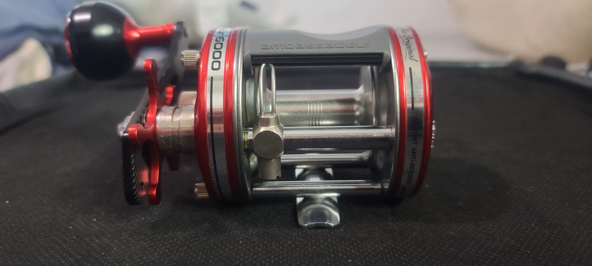 Abu Garcia Ambassaduer 6000 Baitcaster Conventional Reel Fishing - Red FRESHWATER SALTWATER