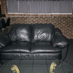 Leather Love Seat.