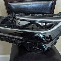 Toyota Prius AWD-E;  Left Headlamp