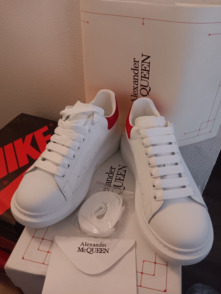 Alexander McQueen red heel Sneaker
