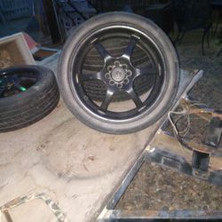 4 Univeral Wheel N tiers Fair Shape Little Under Haif Tread  Have 4 Of Them