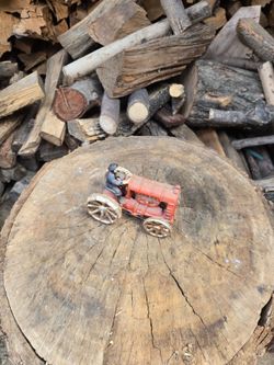 Antique Cast Iron Toy Tractor with Driver
