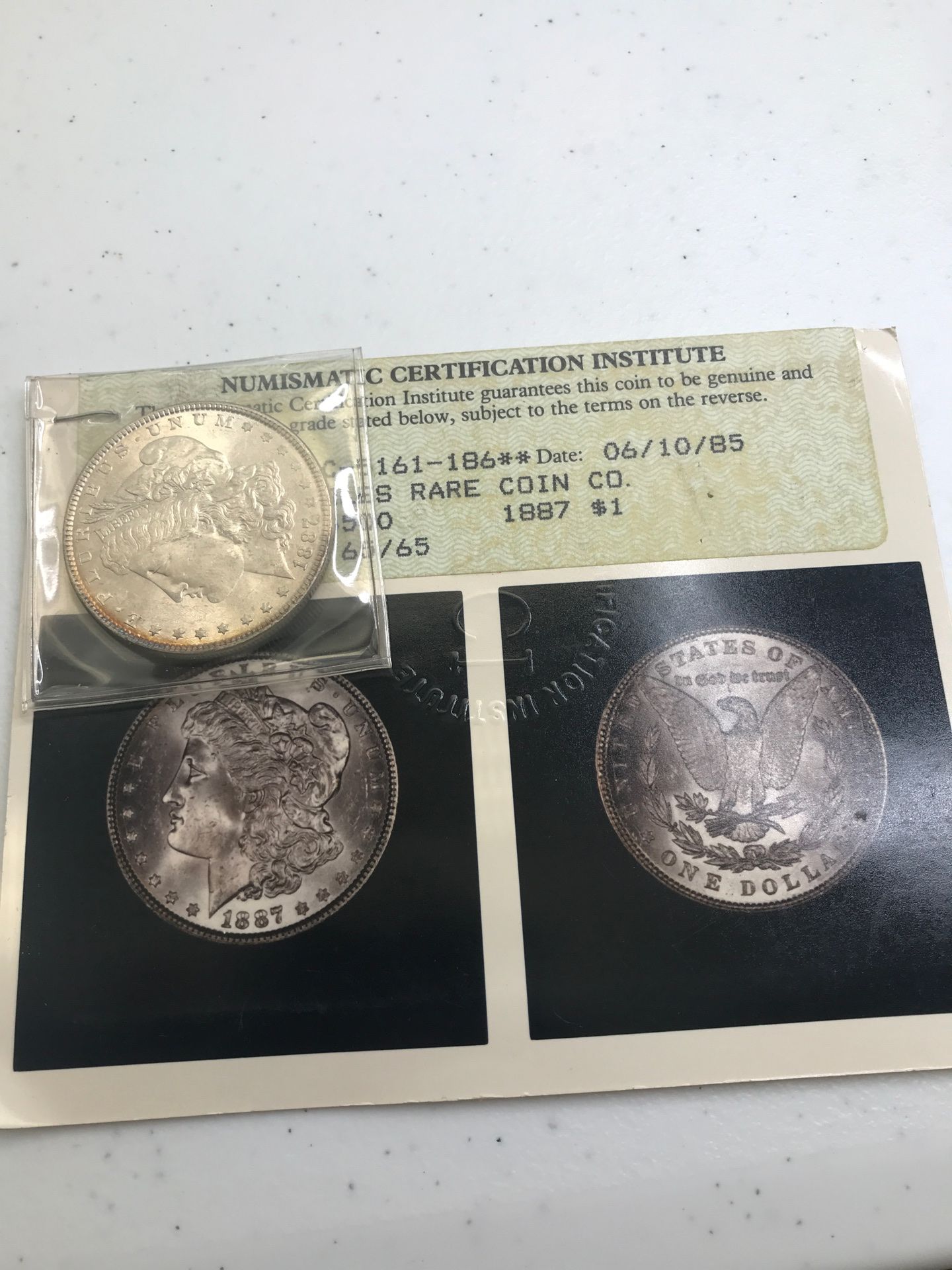 1887 Morgan Silver Dollar w/ COA