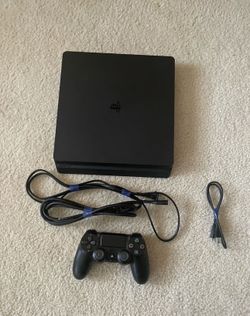 PlayStation 4 Slim Black(Comes with more controllers that in the picture and also 4 different Madden's and other games)