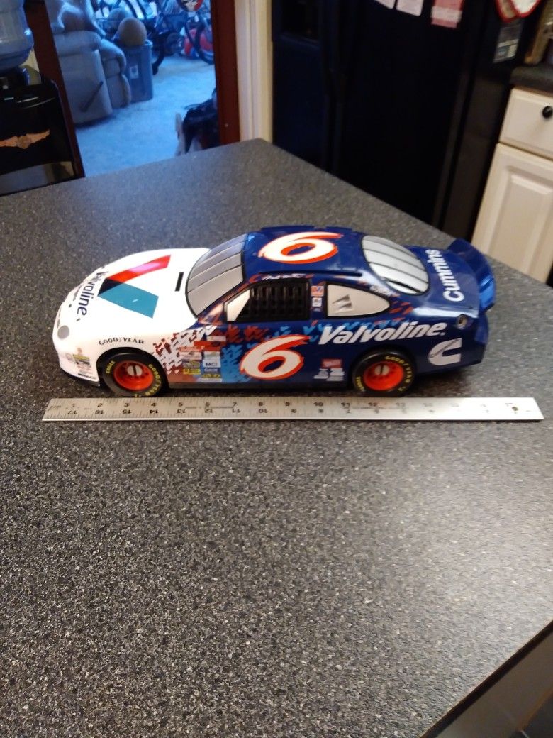 16 Inches Long. Plastic Car.