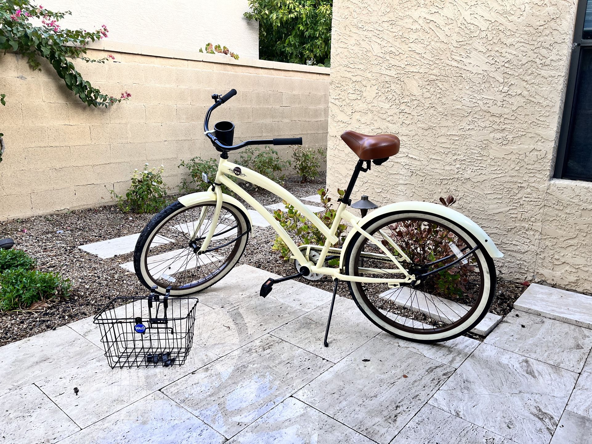 Pastel Yellow Beach Cruiser Bike with Cup Holder, Bell, and Basket.