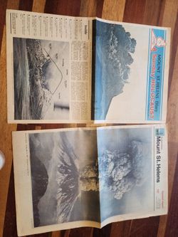 2 different mount st. Helen's newspapers