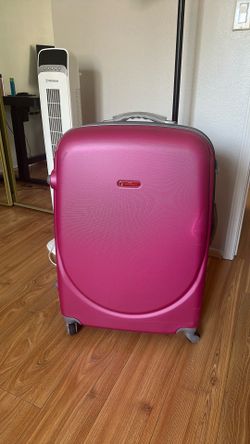 Hot pink hard shell large check in suitcase