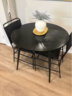Round black table - $90 obo