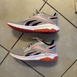 Reebok Gray and Red Sneakers with Sleek Design