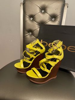 Bebe Wedges size 7