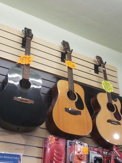 Acoustic Guitars Some With Electronic Conection.