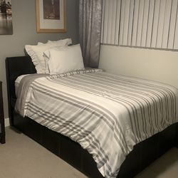 Full size with pull out twin bed at the bottom