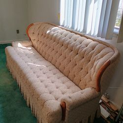 Cloth and oak couch