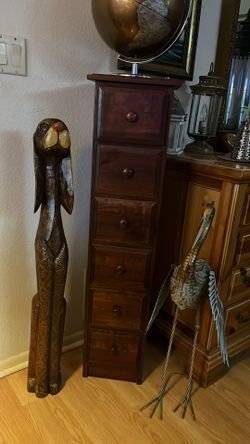 Tall wood chest of drawers