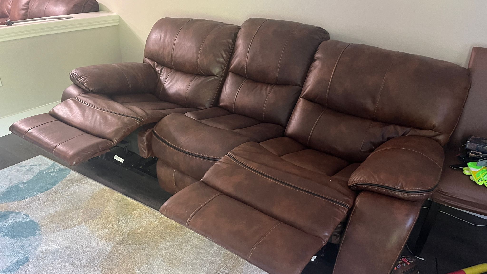 For Sale: Brown Leather Reclining Sofa and Loveseat Set – Great Condition!