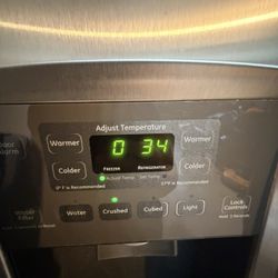 GE Stainless Steel Side-by-Side Refrigerator/Freezer