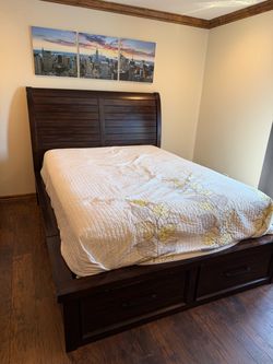 Queen platform bed with draws and tall dresser