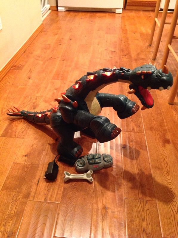 Fisher-Price Imaginext Spike The Ultra Dinosaur w/Remote/Battery/Charger/Bone  for Sale in Auburn, WA - OfferUp