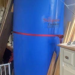 Two 275-gallon Water Storage Tanks