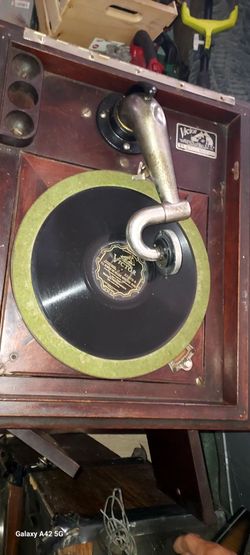 Antique whined up record player