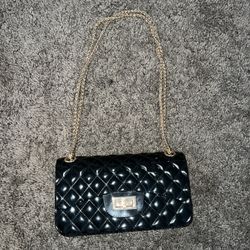 Black Purse With Gold Chain $5