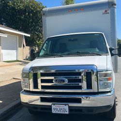 Ford 2013 cargo van with rollup and walk up ramp