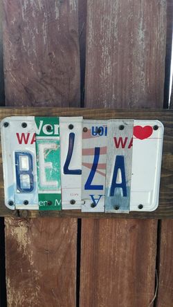 LICENSE PLATE ART OUT OF RECYCLED PLATES WE CAN MAKE CUSTOM WE CAN PUT ANY WORDS ON ONE INCH PINE WOOD STAINED