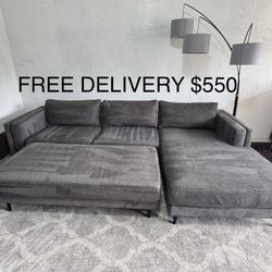 FREE DELIVERY- Grey Living Spaces Sectional with ottoman