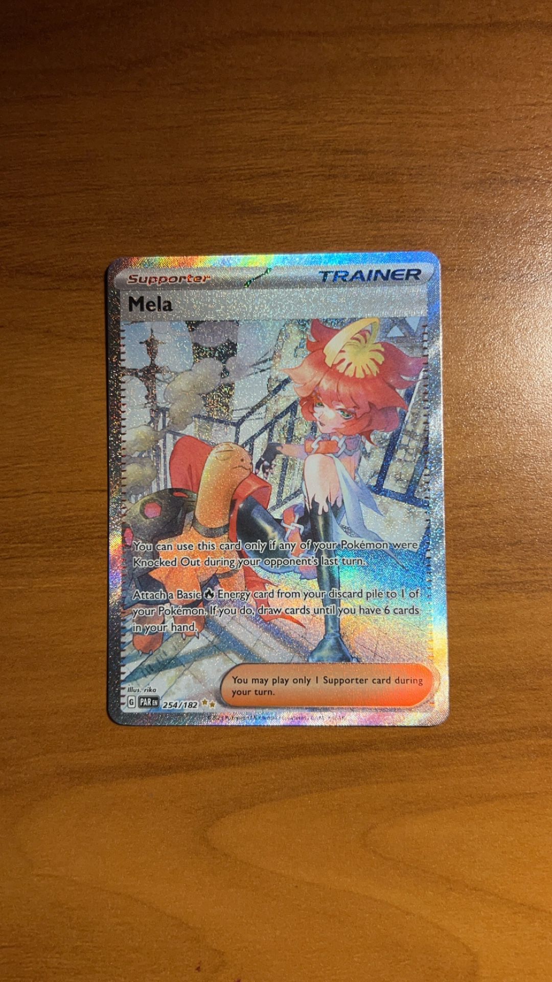 Mela Trainer Pokemon Card