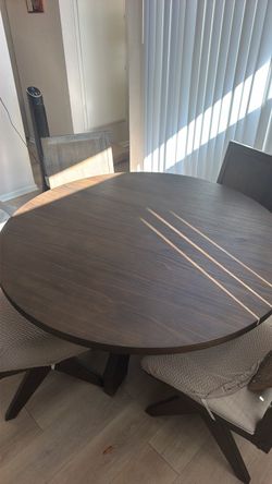 Round Dark Wood Dining Table