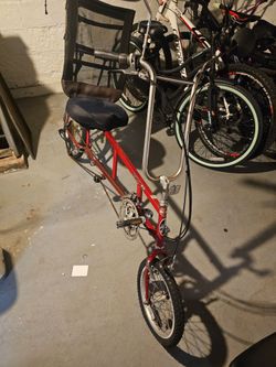 Vintage Red Folding Recumbent-Style Bicycle