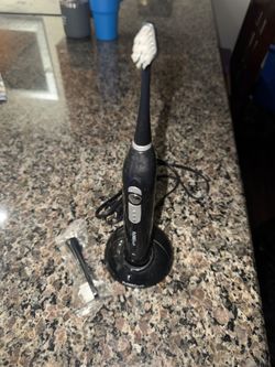 Electric toothbrush with brand new replaceable bristles