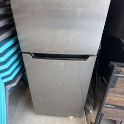 a Danby compact top-freezer refrigerator