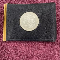 1881 Morgan Silver Dollar In A Wallet