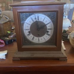 vintage German-made mantel clock, likely featuring Westminster chime
