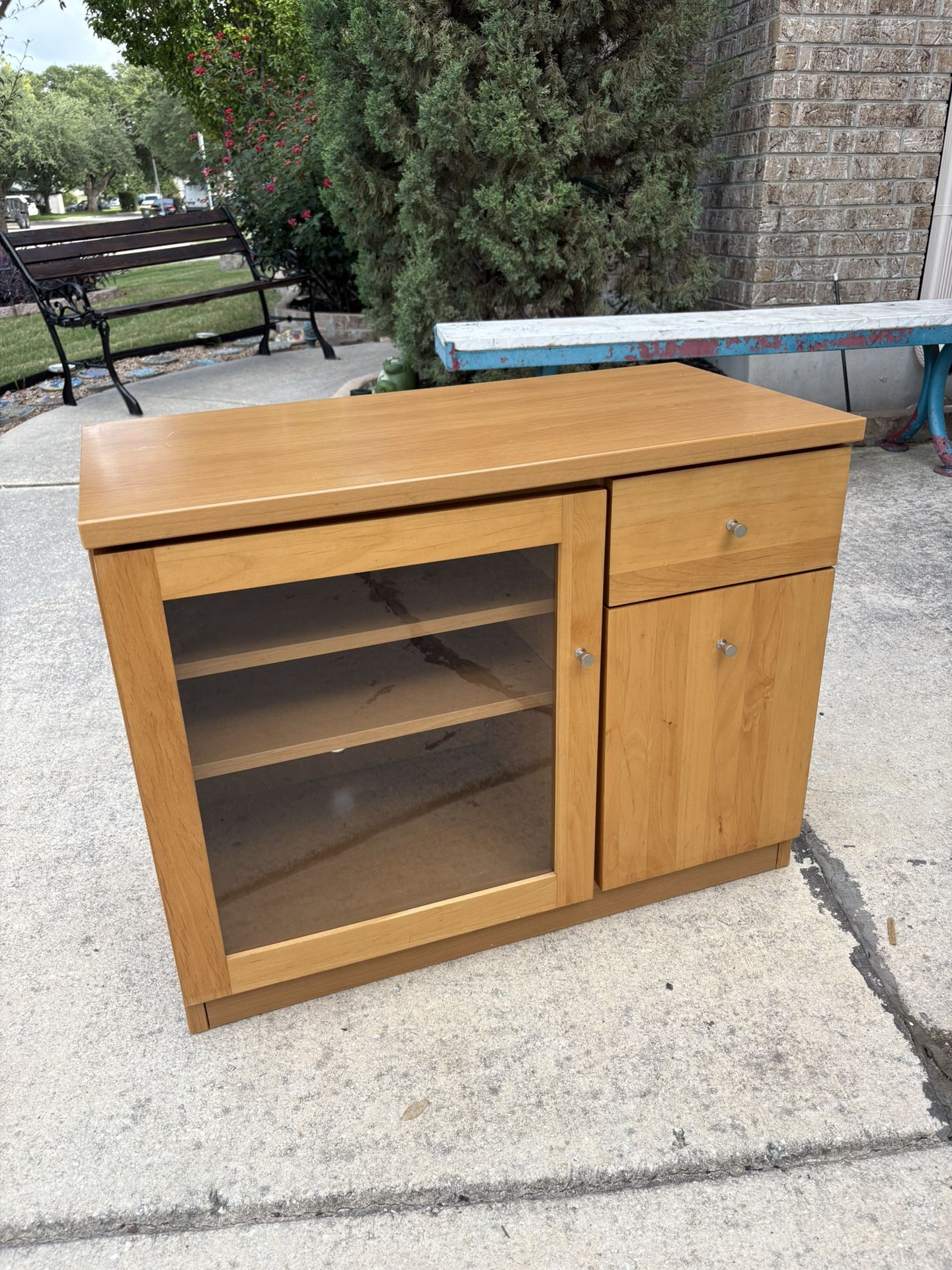Light Oak Multi Purpose Cabinet With Glass Door And Shelves And Two Side Drawers