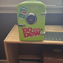 mt dew fridge with speaker on front 