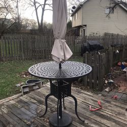 Bar Height Cast Iron Table With Umbrella And Base