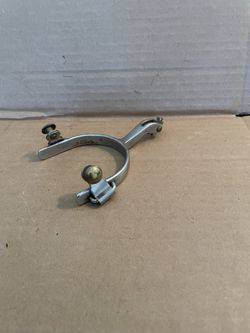 One vintage spur