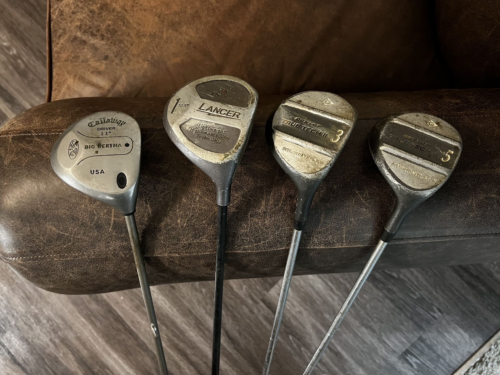 Old Drivers, Woods, And Putter