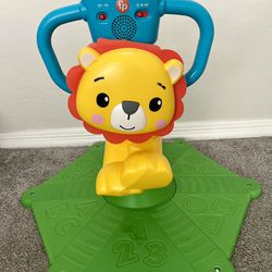 Fisher-Price Bounce & Spin Lion Stationary Ride-On Electronic Learning Toy for Toddlers