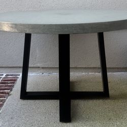 Four Hands 48” Round Cyrus Table Retail $1,150 (has blemishes from being in an open area outside though-see pics)